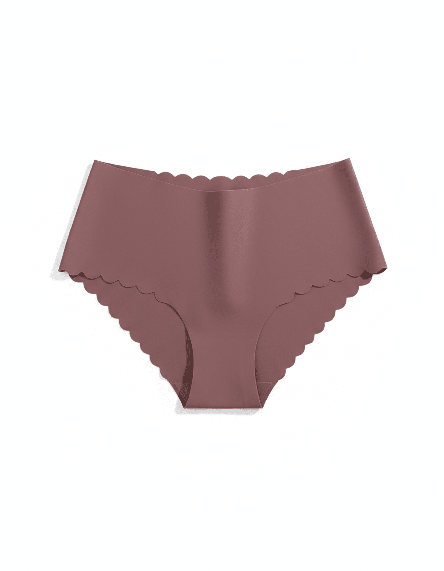 Seamless no show invisible briefs with scalloped edges in mauve color on white background
